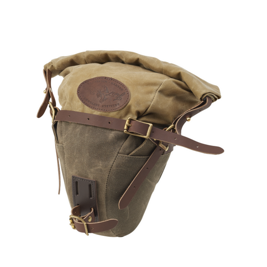 A uniquely designed bike bag that connects to the seat with leather straps and buckles.  