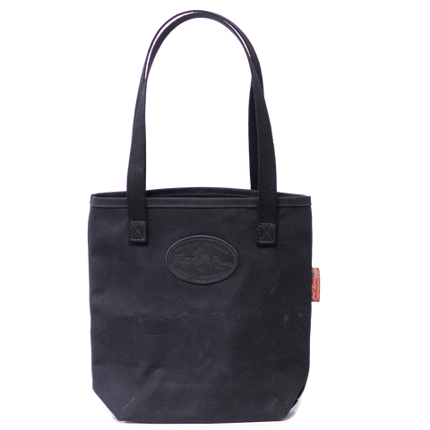 Black waxed canvas tote bag / office bag with luggage handle attachment  leather handles and shoulder