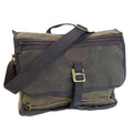The front of the Tettegouche Messenger Bag contains a heavy duty nylon zipper on top main lid, a solid brass G-hook to close the bag. A strong webbed cotton shoulder strap reinforced by hand sown cotton webbed attachment points keep this bag mobile. 