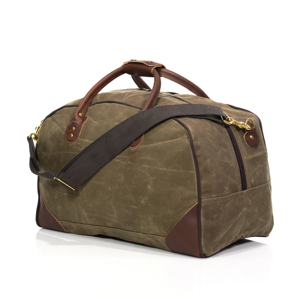 Handcrafted large luggage bag, with adjustable cotton web shoulder strap.