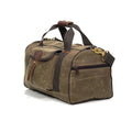 Frost River duffel bag with zippered pockets on each end of the bag for additonal storage and a strong shoulder strap with solid brass attachment points to each end of the bag.