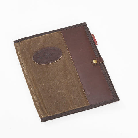 The Padfolio rocks a 50/50 high quality waxed canvas and premium high-end leather cover and a durable solid brass snaps keep the Padfolio shut.
