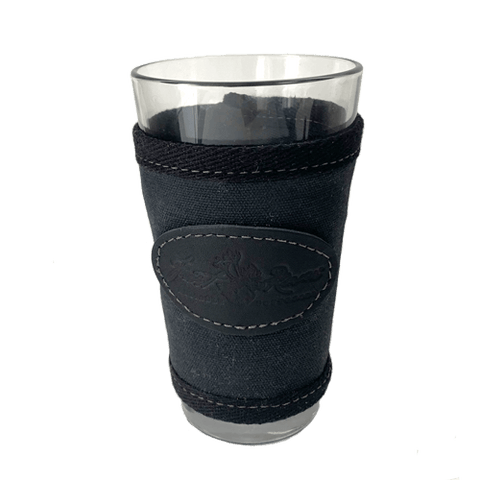 The pint glass sleeve comes in field tan and heritage black.