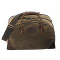 Traditional luggage bag with premium leather, field tan waxed canvas, and solid brass attachments.