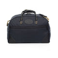 Heritage black luggage bag with zippered exterior pockets and reinforced corners.
