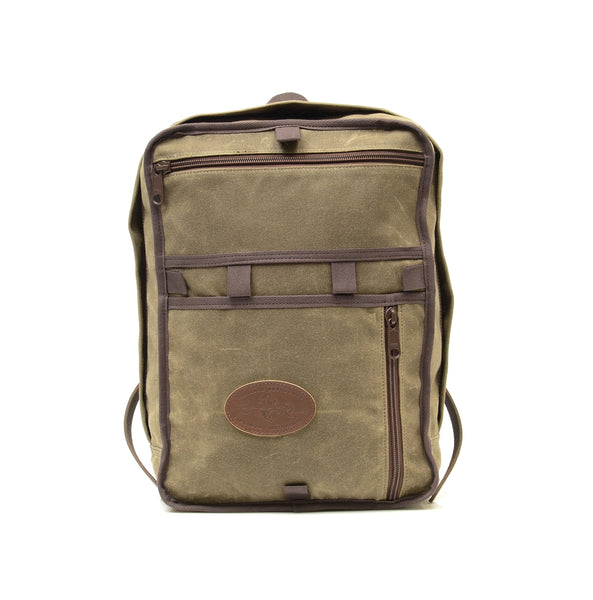 Durable waxed canvas backpack with high quality zippered openings  and handcrafted at Frost River Trading Co.