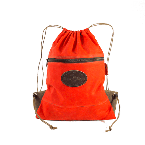 Hunter Orange version this day pack made from the same durable waxed canvas and handcrafted at Frost River Trading Co.