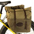 These panniers are handcrafted with premium American sourced waxed canvas, leather, and brass.
