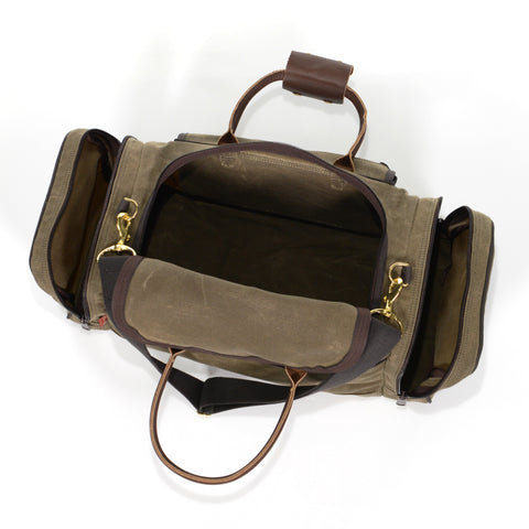 Duffle with large zippered opening and easy access zippered side pockets.