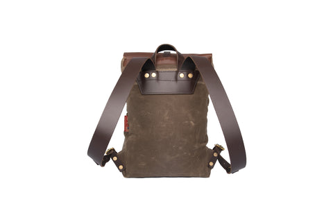 Handcrafted small day pack has premium leather shoulder straps and high quality brass buckles.