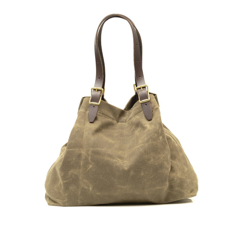 The Bazaar Tote is available in Field Tan and Heritage Black waxed canvas.
