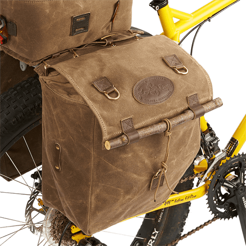 These bike panniers have a classic look and a unique flap closure.
