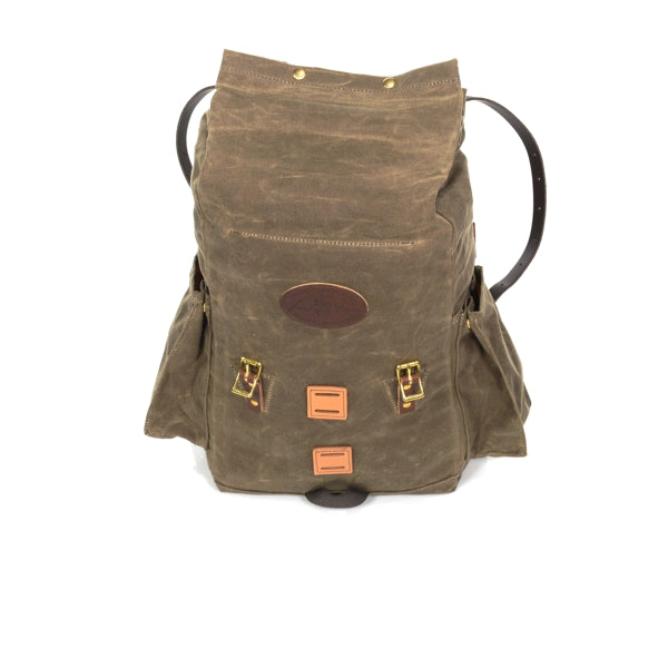 Front view of backpack with side pockets closed with brass snaps.