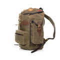 The side pockets on this backpack can hold water bottles and close with a quick flap and leather strap design.