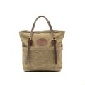 This large tote bag comes with adjustable premium leather straps attached to solid brass buckles.