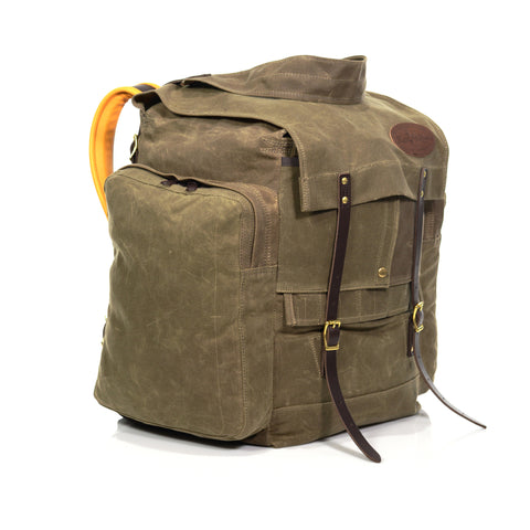 This canoe pack has a lot of depth for storage and includes a removable utensil roll for holding cooking utensils and is snapped flat under the flap closure.