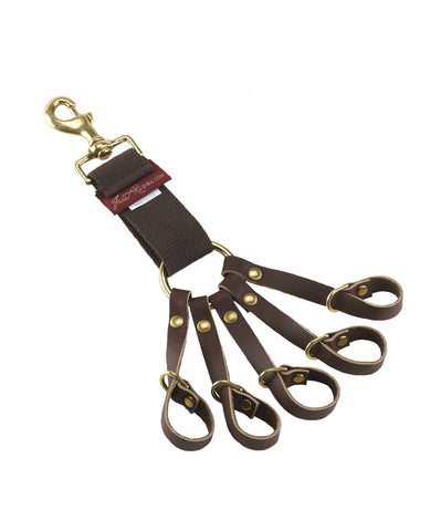 The game strap and game clip are both made with premium leather and solid brass.  Made in the USA.