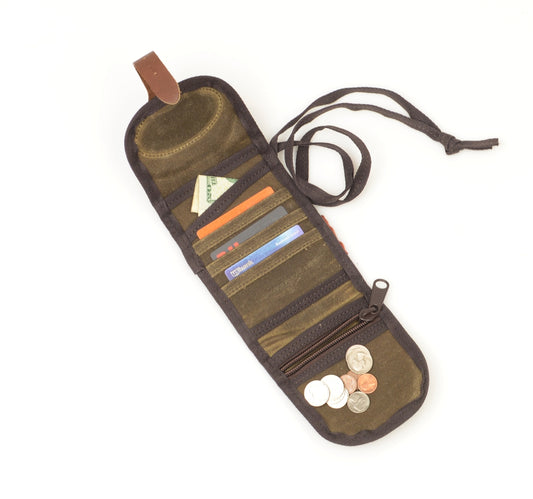 A small zippered pocket at the bottom for coins and several slip pockets above for cards and cash storage.
