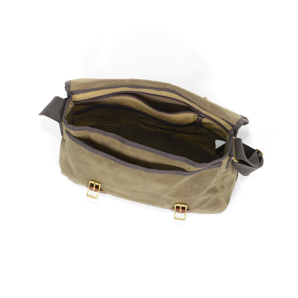 The interior of the Carrier Brief Messenger Bag contains a roomy main compartment with several smaller pockets and a heavy duty zippered pocket as well.