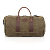 Handcrafted duffle bag, made from durable waxed canvas, premium leather, and solid brass