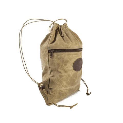 Side view of day pack showing large front zippered pocket and heavy duty cord used for the shoulder straps made by hand in Duluth Minnesota.