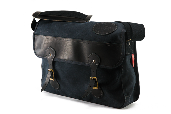 The Carrier Brief Messenger Bag line up also comes in our classic Heritage Black. Still handcrafted with our high-end premium materials. 