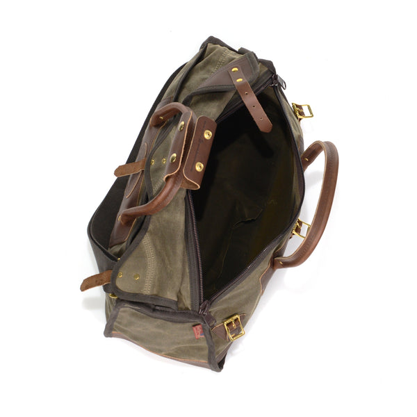 Waxed canvas luggage bag, with versatile storage.