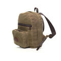 Side view of backpack to show large zippered main compartment with easy grab handle on the top of the pack.