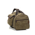 Field tan, large luggage bag, with zippered side pocket.